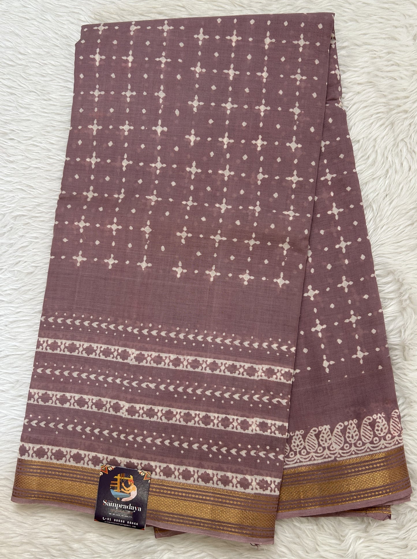 Banarasi Cotton Saree Light Lilac Colored Complemented with a Zari Border. - Sampradaya Designer Studio