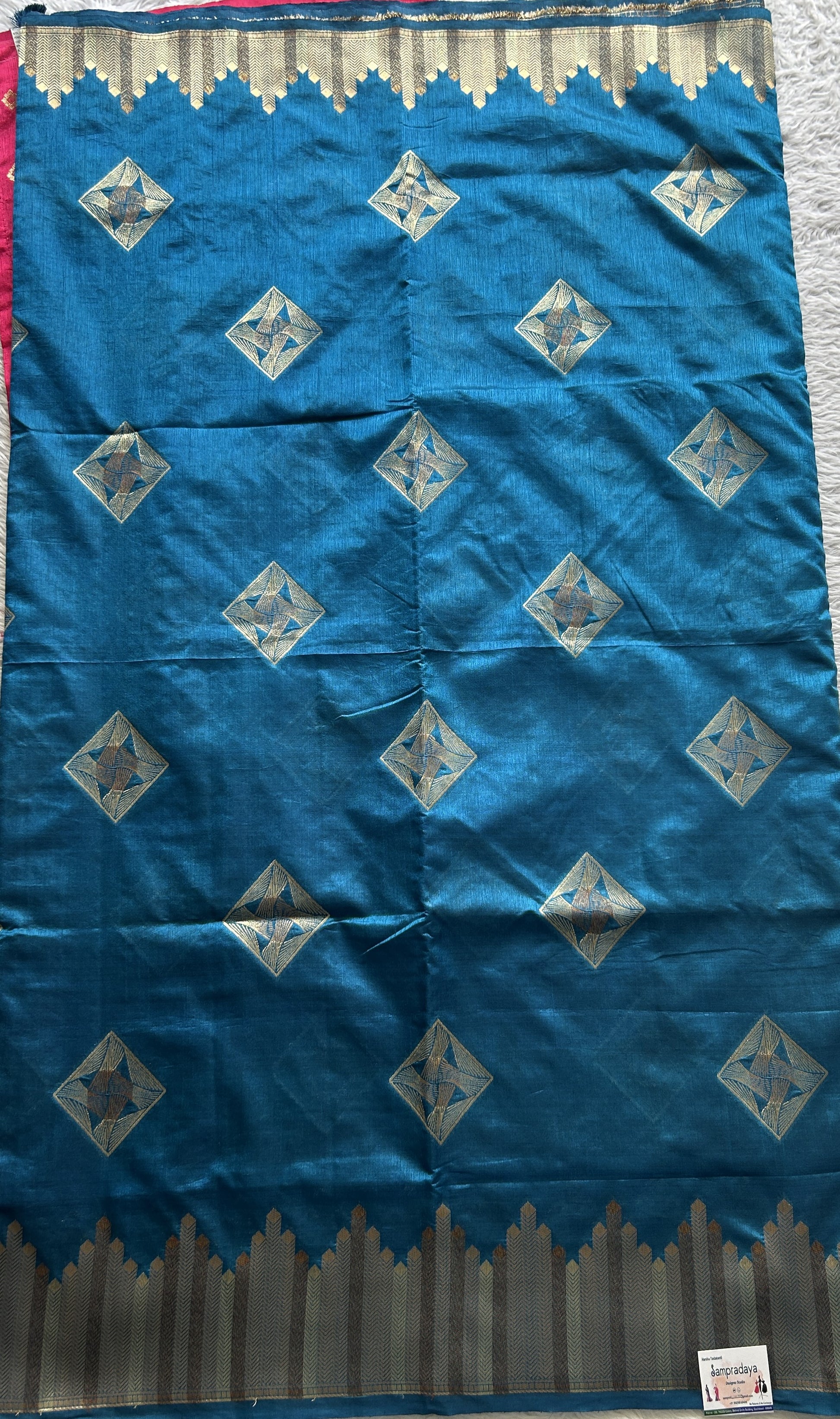 Semi Raw Silk Saree Dark Peacock Blue Colored Complemented with a Zari Border. - Sampradaya Designer Studio