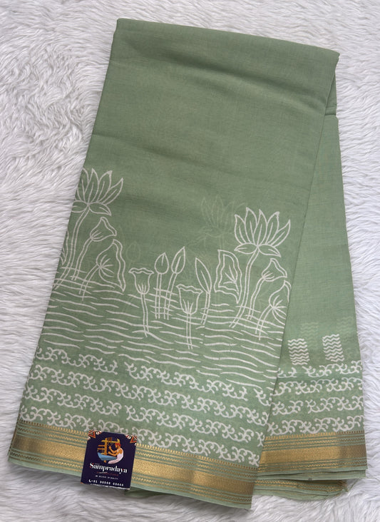 Banarasi Cotton Saree Green Colored Complemented with a Zari Border. - Sampradaya Designer Studio