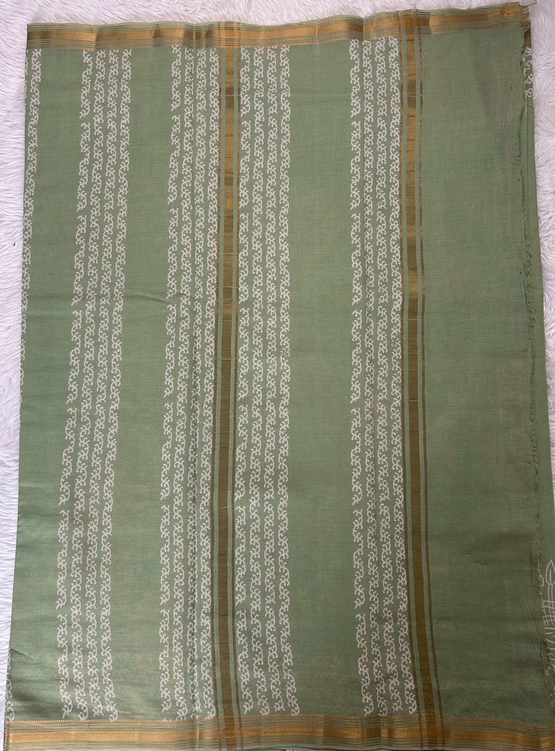 Banarasi Cotton Saree Green Colored Complemented with a Zari Border. - Sampradaya Designer Studio