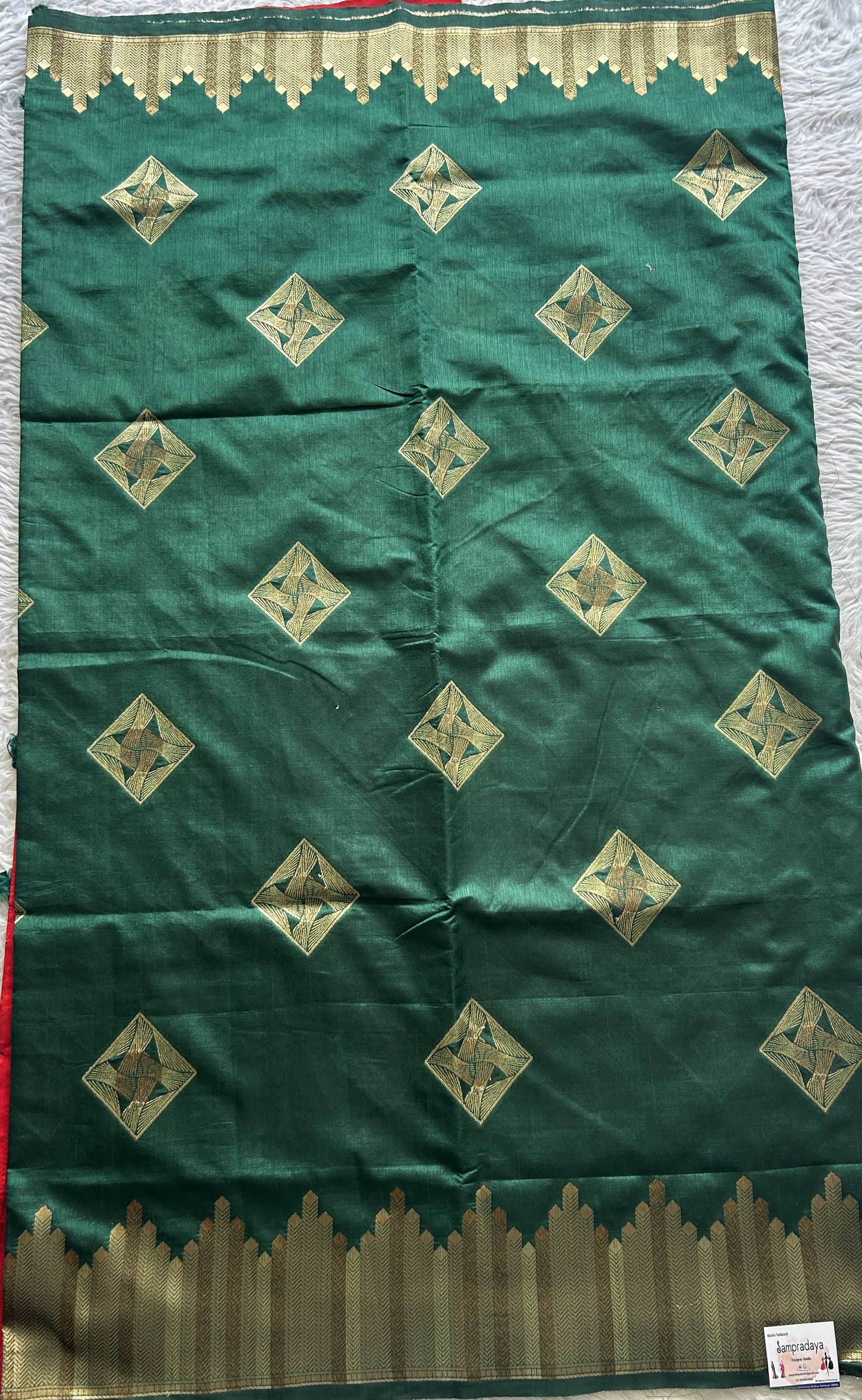 Semi Raw Silk Saree Dark Green Colored Complemented with a Zari Border. - Sampradaya Designer Studio