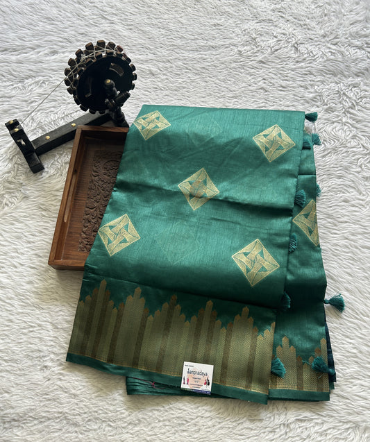 Semi Raw Silk Saree Turquoise Green Colored Complemented with a Zari Border. - Sampradaya Designer Studio