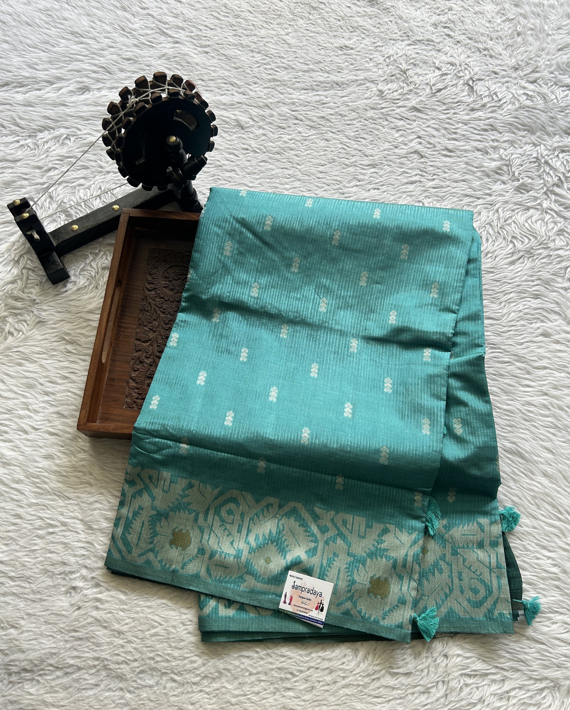 Semi Raw Silk Saree Aqua Blue Colored Complemented with a Zari Border. - Sampradaya Designer Studio