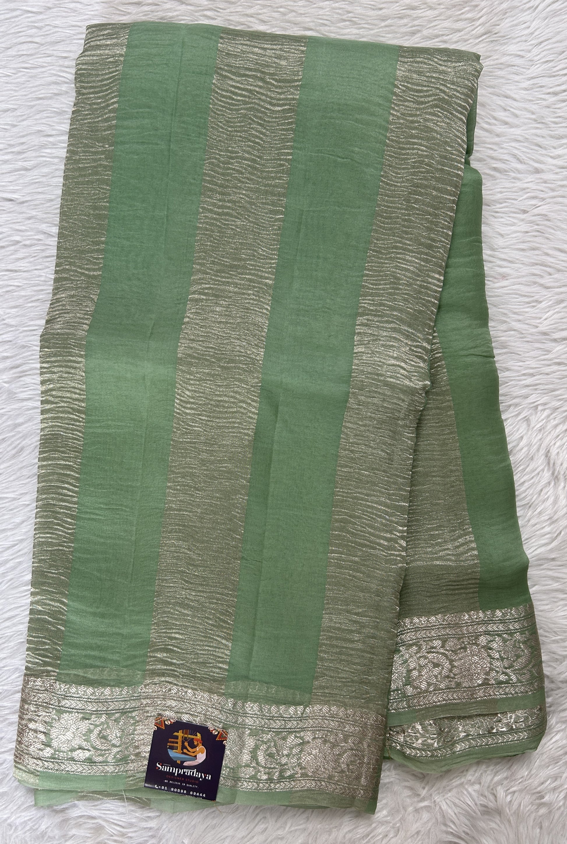 Banarasi Crushed Silk Saree Pastel Green Colored Complemented with a Zari border. - Sampradaya Designer Studio