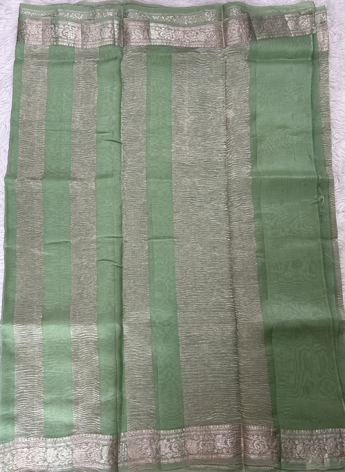 Banarasi Crushed Silk Saree Pastel Green Colored Complemented with a Zari border. - Sampradaya Designer Studio