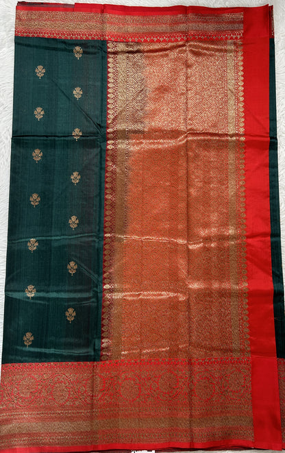 Dupion Silk Saree Bottle Green Colored Complemented with a Red Color Zari Border. - Sampradaya Designer Studio