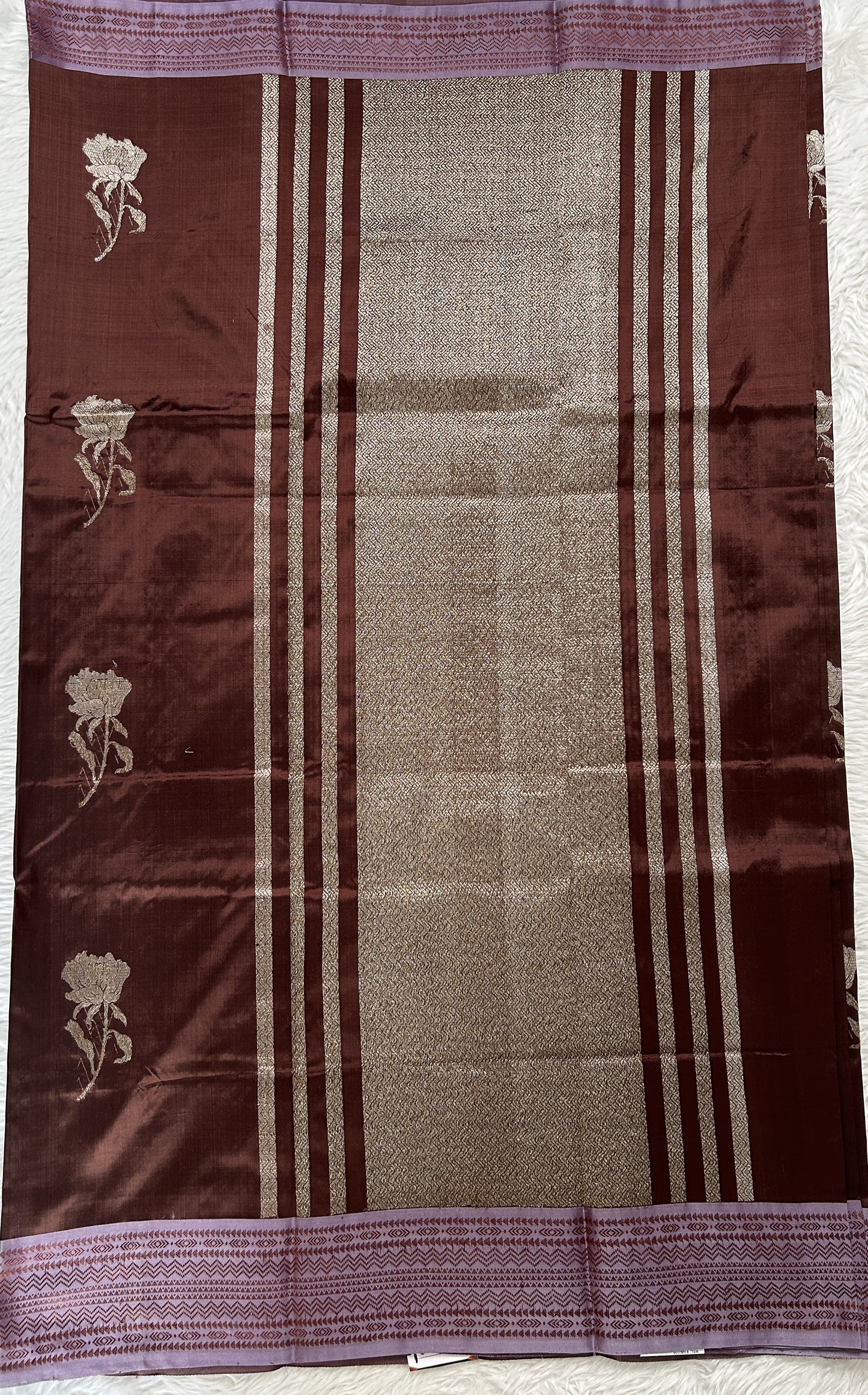 Banarasi Katan Silk Saree Brown Colored Complemented with a Lilac Color Zari border. - Sampradaya Designer Studio