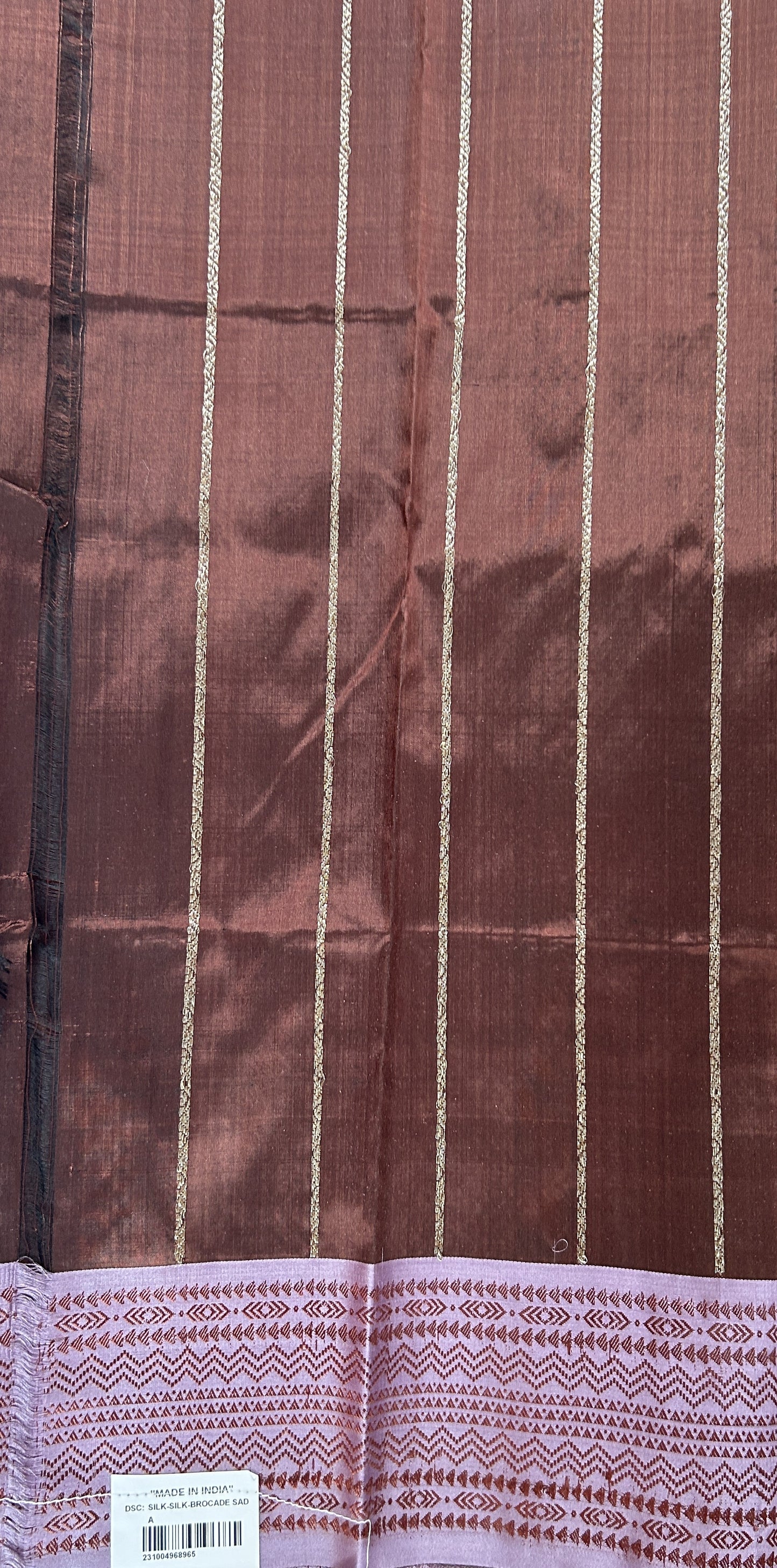 Banarasi Katan Silk Saree Brown Colored Complemented with a Lilac Color Zari border. - Sampradaya Designer Studio