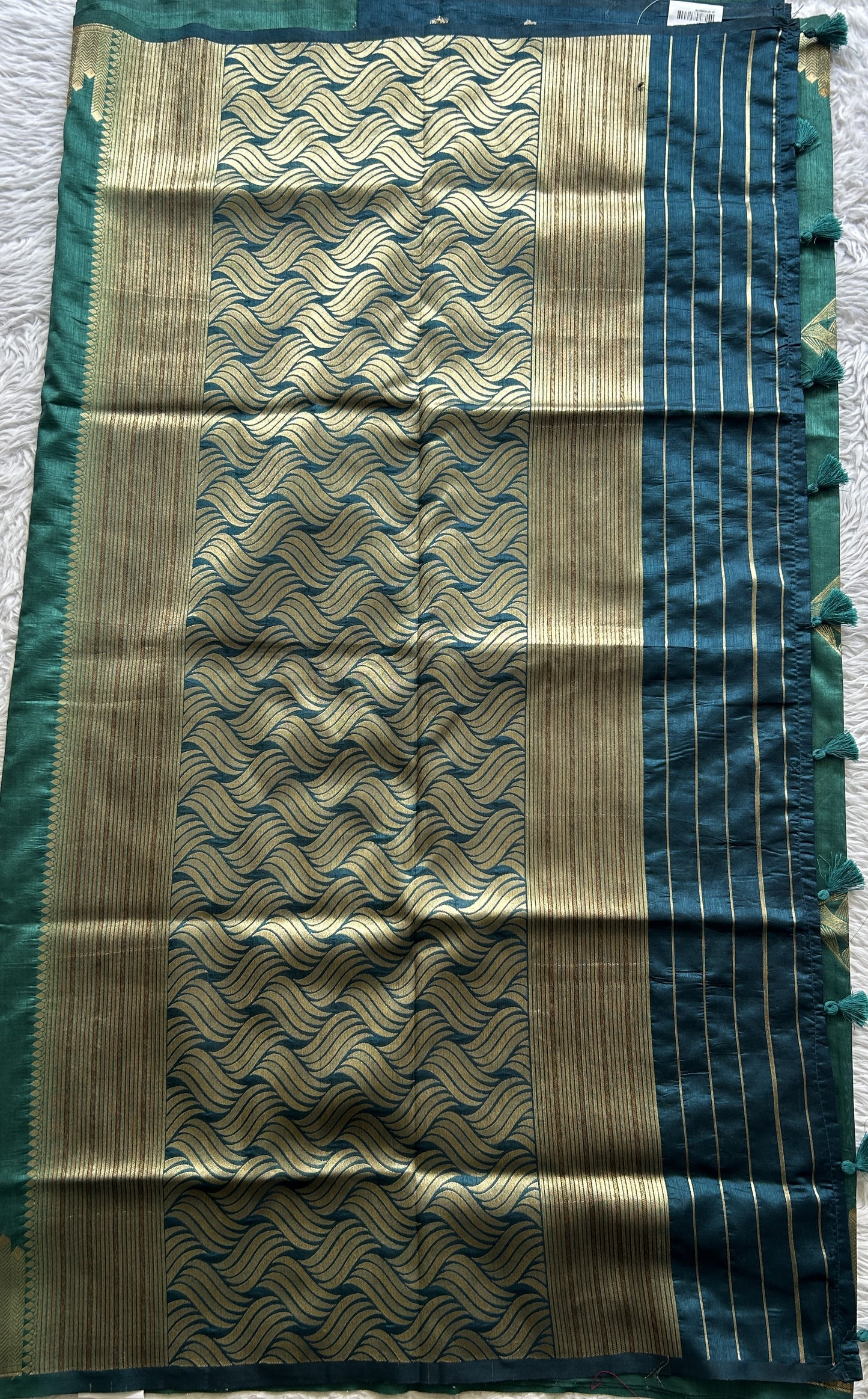 Semi Raw Silk Saree Turquoise Green Colored Complemented with a Zari Border. - Sampradaya Designer Studio