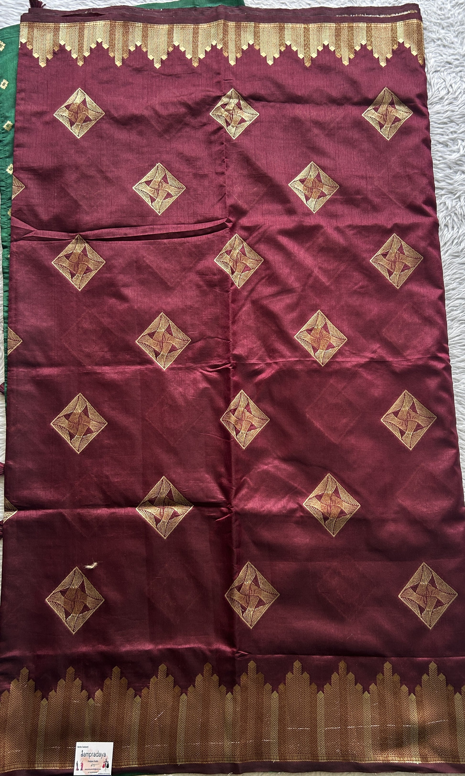 Semi Raw Silk Saree Dark Maroon Colored Complemented with a Zari Border. - Sampradaya Designer Studio