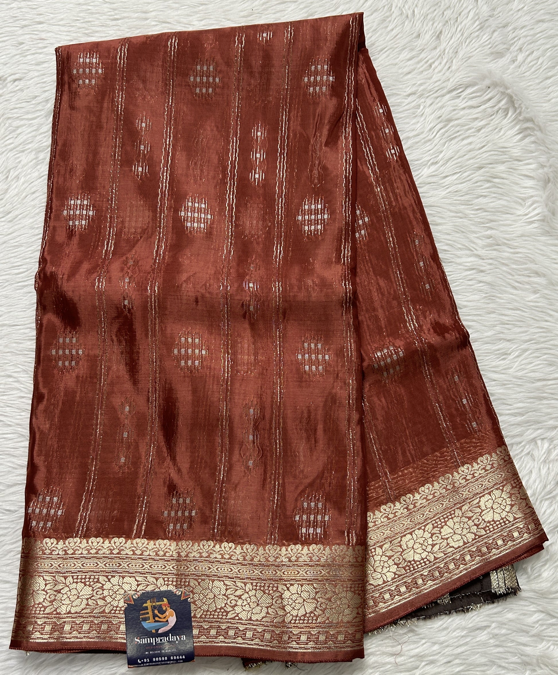 Satin Georgette Saree Brown Colored Complemented with a Zari Border. - Sampradaya Designer Studio