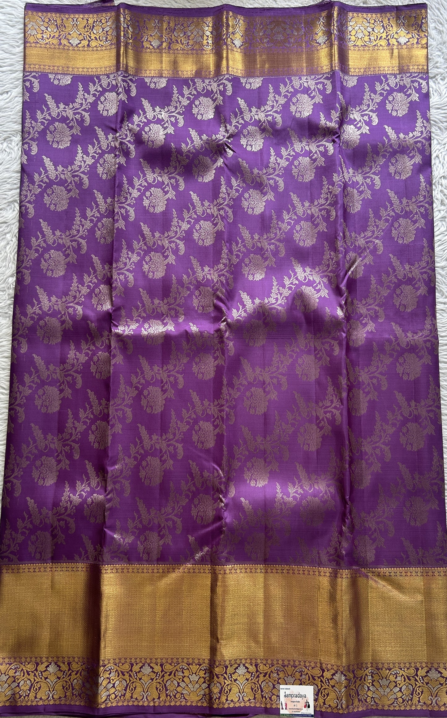 Kanjivaram Bridal Silk Saree Lavender colored Saree complemented with a Zari border.