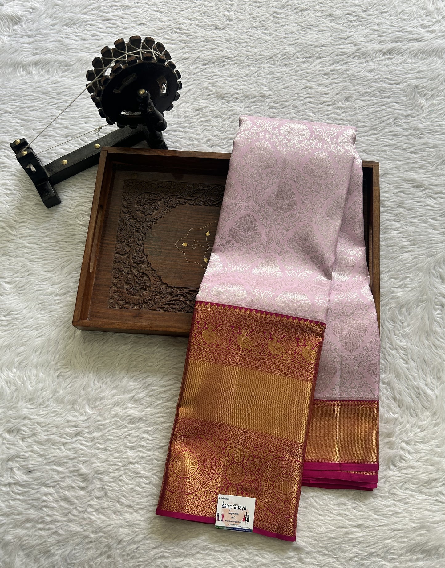 Kanjivaram Bridal Silk Saree Baby Pink colored complemented with a Zari border.