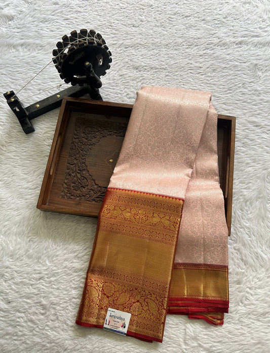 Kanjivaram Bridal Silk Saree Light Peach colored complemented with a Zari border. - Sampradaya Designer Studio