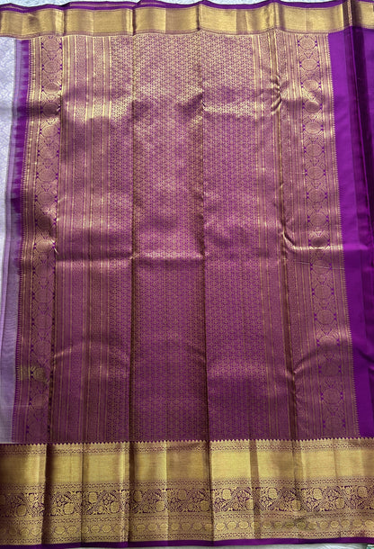 Kanjivaram Bridal Silk Saree Light Lilac colored complemented with a Zari border.