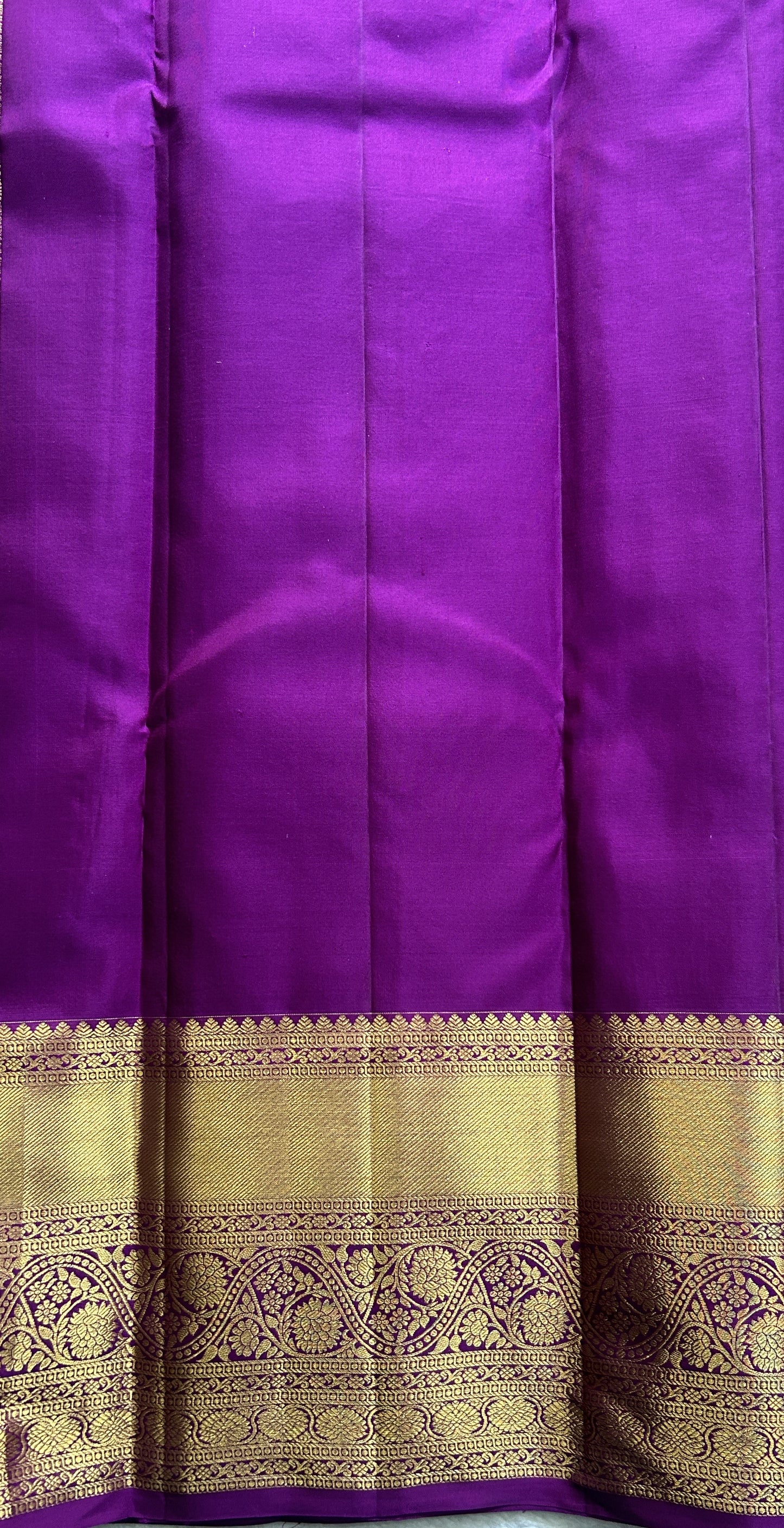 Kanjivaram Bridal Silk Saree Light Lilac colored complemented with a Zari border.