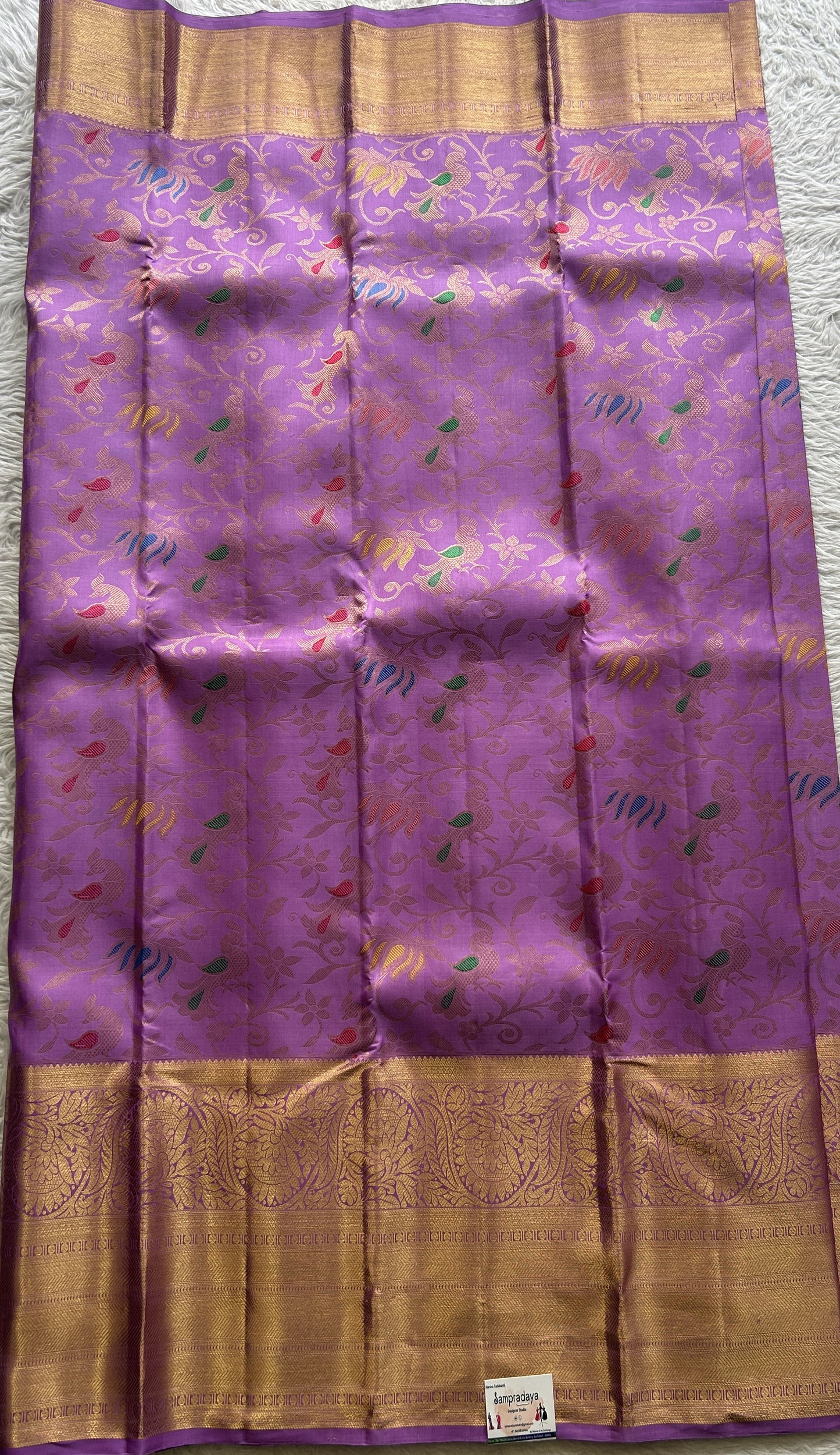 Kanjivaram Bridal Silk Saree Plum colored complemented with a Zari border.