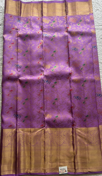 Kanjivaram Bridal Silk Saree Plum colored complemented with a Zari border.