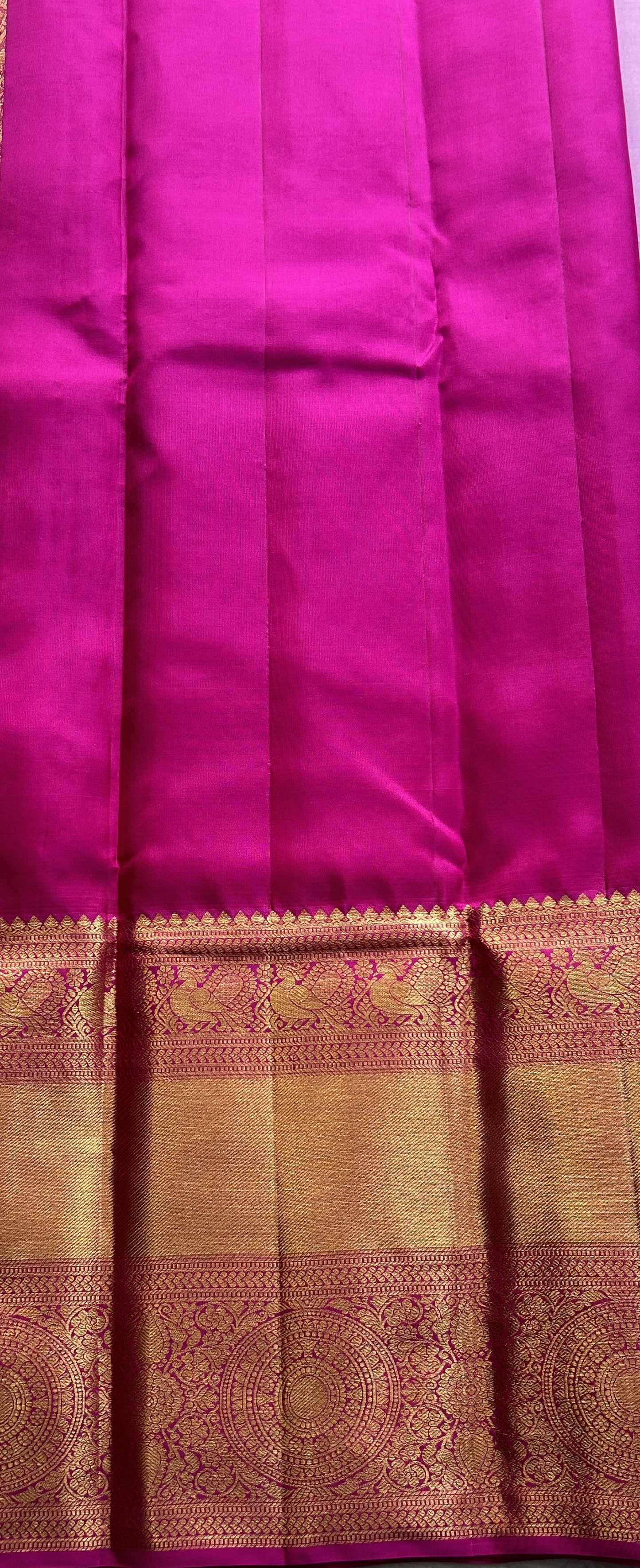 Kanjivaram Bridal Silk Saree Baby Pink colored complemented with a Zari border.