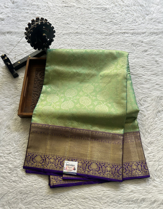 Kanjivaram Bridal Silk Saree Light Green colored complemented with a Violet Color Zari border - Sampradaya Designer Studio