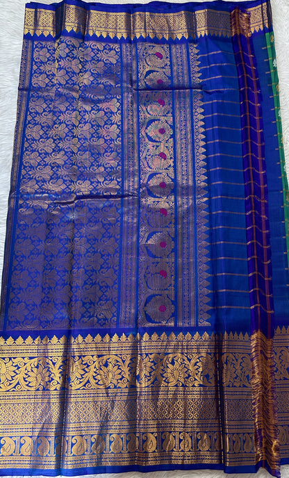 Gadwal Pattu Saree Green Colored Complemented With a Ink Blue Color Kanchi Border - Sampradaya Designer Studio