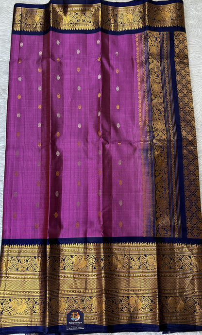 Gadwal Silk Saree Magenta Colored Complemented With a Navy Blue Color Kanchi Border - Sampradaya Designer Studio