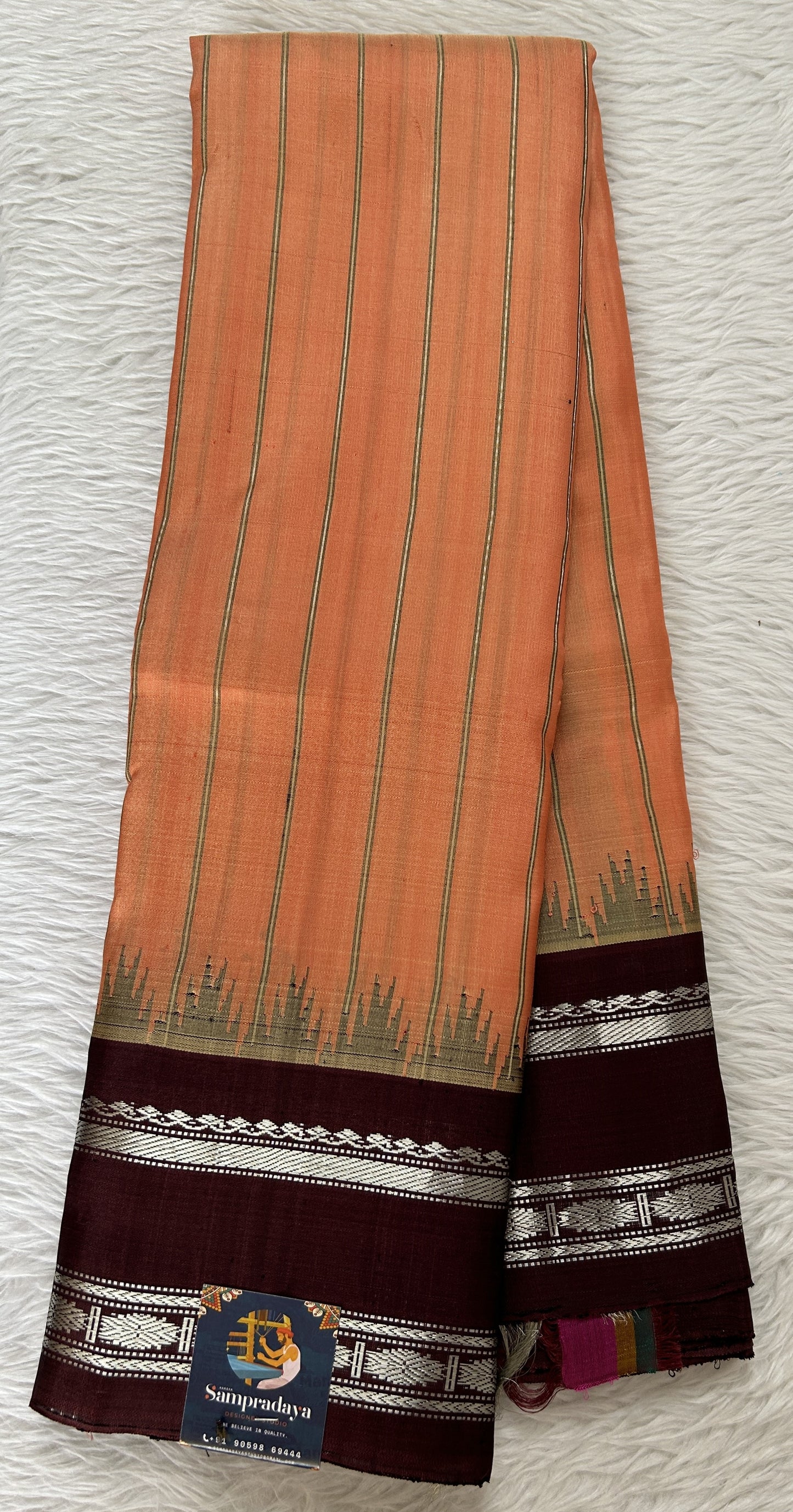 Gadwal Silk Saree Orange Colored Complemented With a Brown Color Kanchi Gap Border - Sampradaya Designer Studio