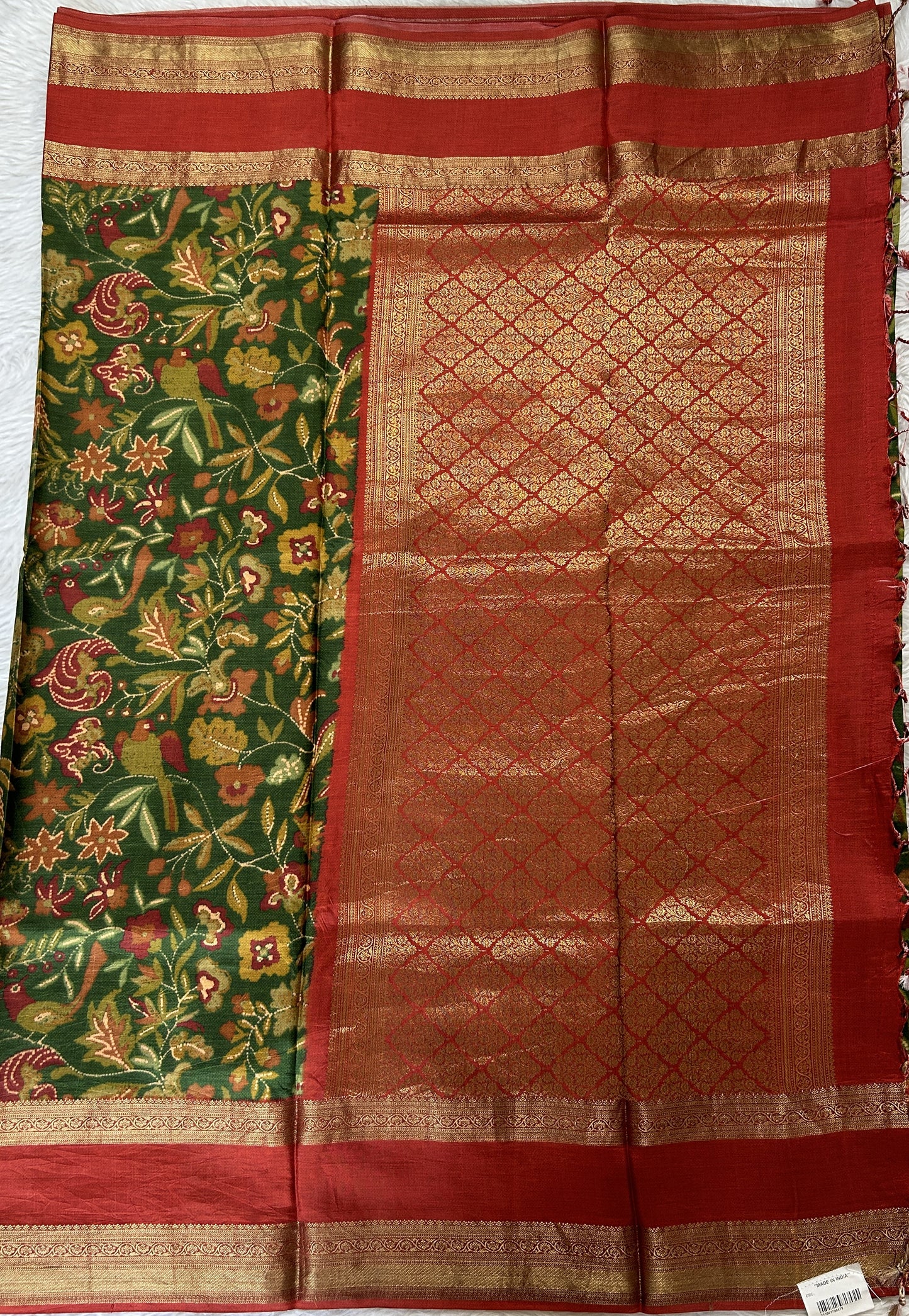 Banarasi Georgette Saree Bottle Green Colored Complemented with a Brick Red Zari border. - Sampradaya Designer Studio