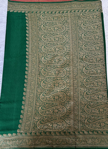 Banarasi Georgette Saree Bottle Green Colored Complemented with a Zari border. - Sampradaya Designer Studio