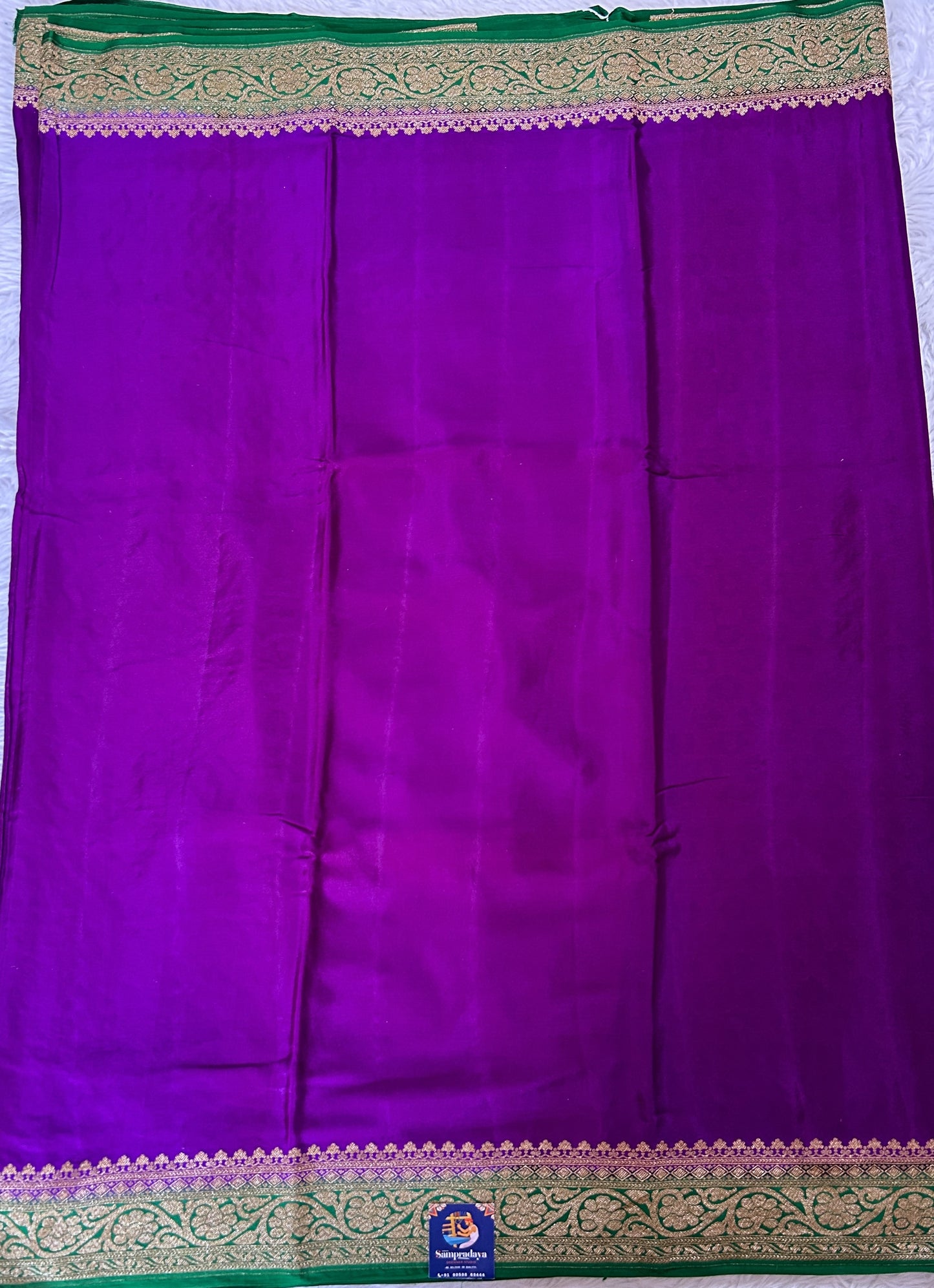 Banarasi Georgette Saree Purple Colored Complemented with a Green Color Zari border. - Sampradaya Designer Studio