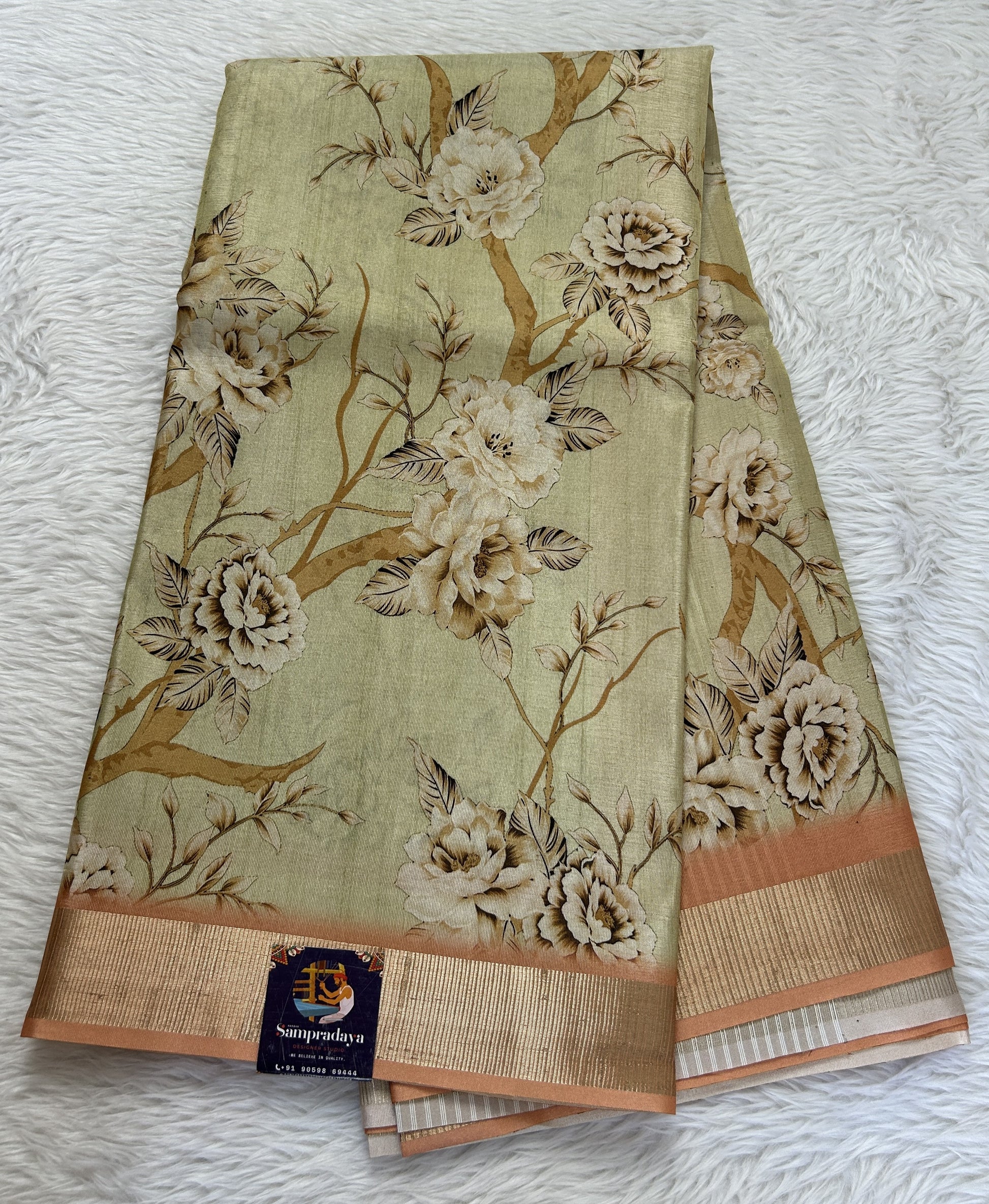 Semi Tussar Tissue Designer Saree Light Lemon Green colored Saree complemented with a Pastel Orange Zari Border. - Sampradaya Designer Studio