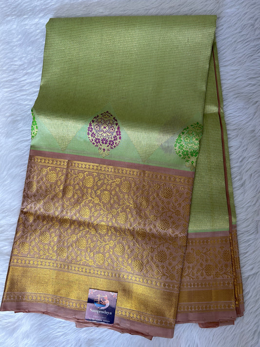 Venkatagiri Pattu Saree Pista Green Colored Complemented With a Pattu Nude Pink Color Border - Sampradaya Designer Studio