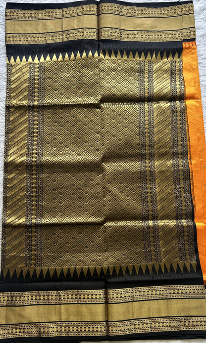 Narayanpet Silk Saree Orange Colored Complemented with a Black Zari Border. - Sampradaya Designer Studio