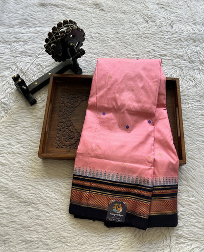 Narayanpet Silk Saree Pink Colored Complemented with a Navy Blue Zari Border.