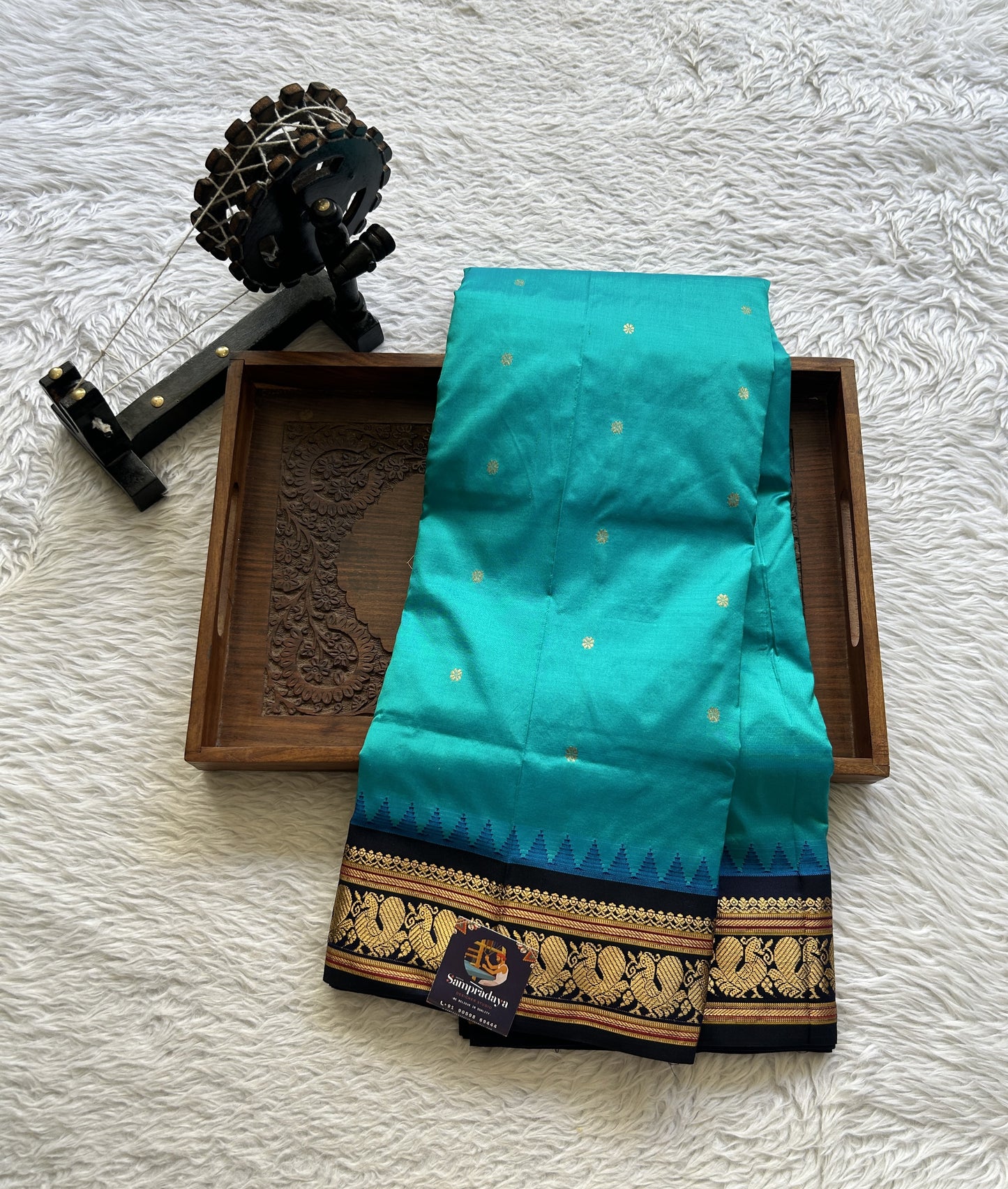 Narayanpet Silk Saree Rama Green Colored Complemented with a Navy Blue Zari Border.