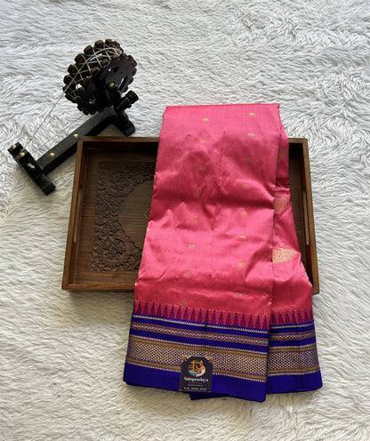 Narayanpet Silk Saree Pink Colored Complemented with a Blue Zari Border.