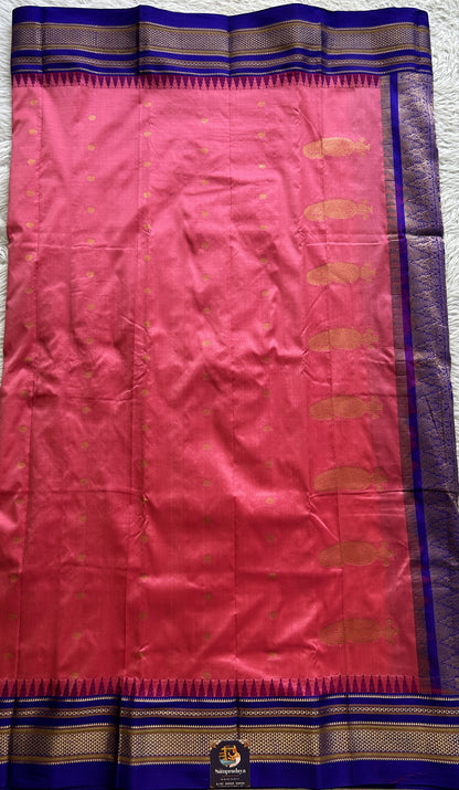 Narayanpet Silk Saree Pink Colored Complemented with a Blue Zari Border.