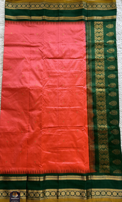 Narayanpet Silk Saree Dark Peach Colored Complemented with a Dark Green Zari Border.