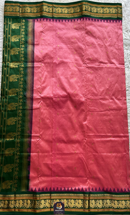 Narayanpet Silk Saree Dark Pink Colored Complemented with a Green Zari Border.