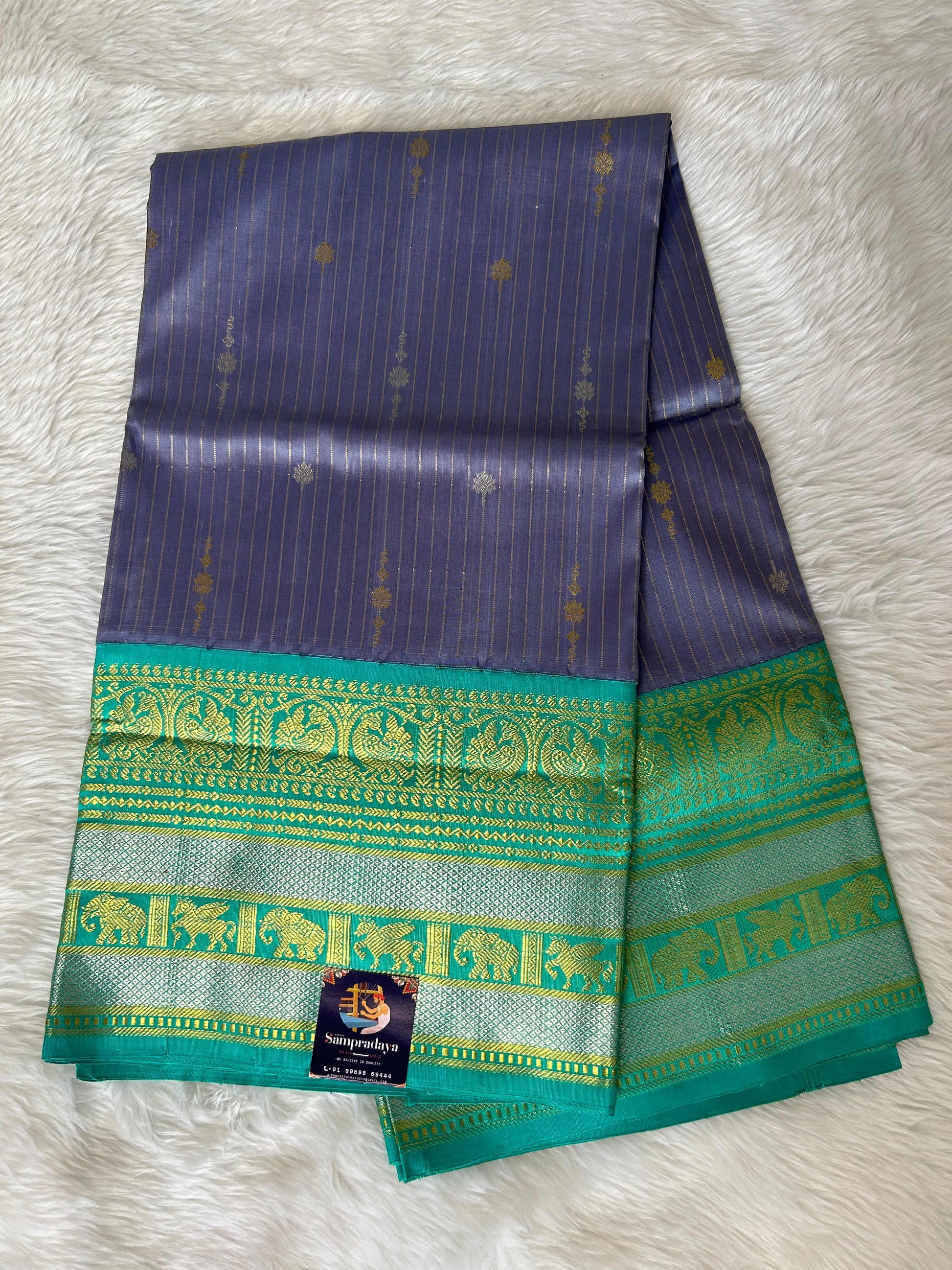 Venkatagiri Pattu Saree Ash Blue Colored Complemented With a Pattu Sea Blue Color Border - Sampradaya Designer Studio