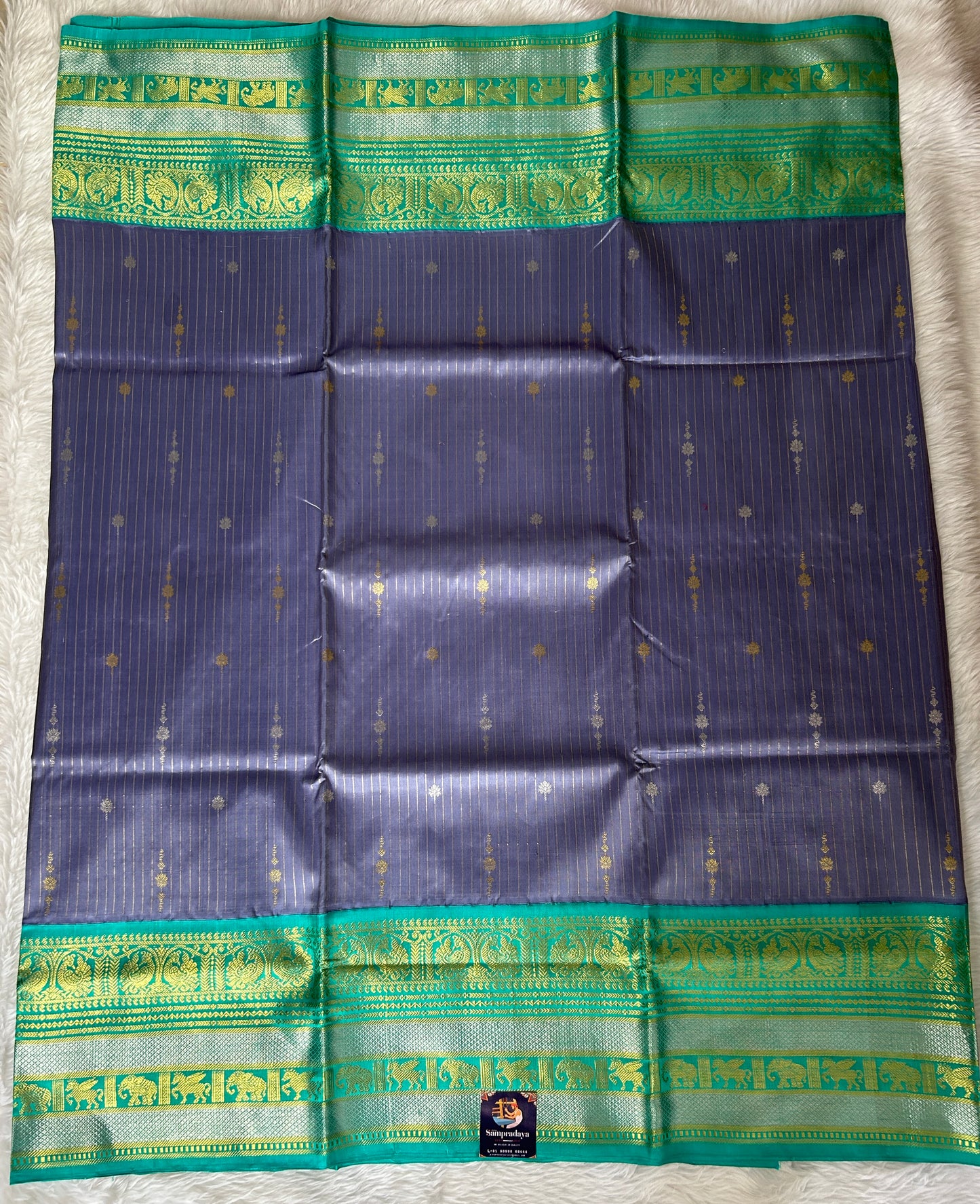 Venkatagiri Pattu Saree Ash Blue Colored Complemented With a Pattu Sea Blue Color Border - Sampradaya Designer Studio