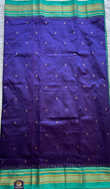 Narayanpet Silk Saree Violet Colored Complemented with a Rama Green Zari Border.