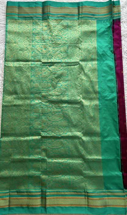 Narayanpet Silk Saree Purple Colored Complemented with a Rama Green Zari Border.