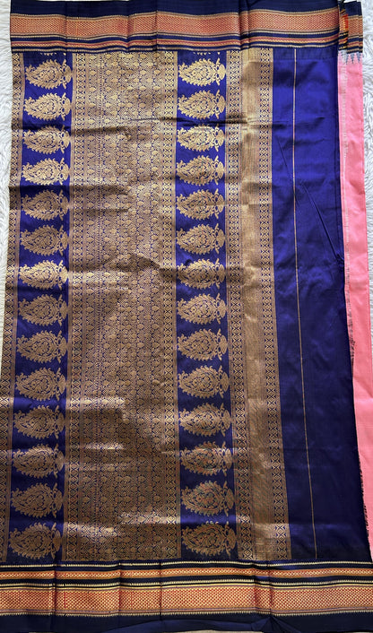 Narayanpet Silk Saree Pink Colored Complemented with a Navy Blue Zari Border.