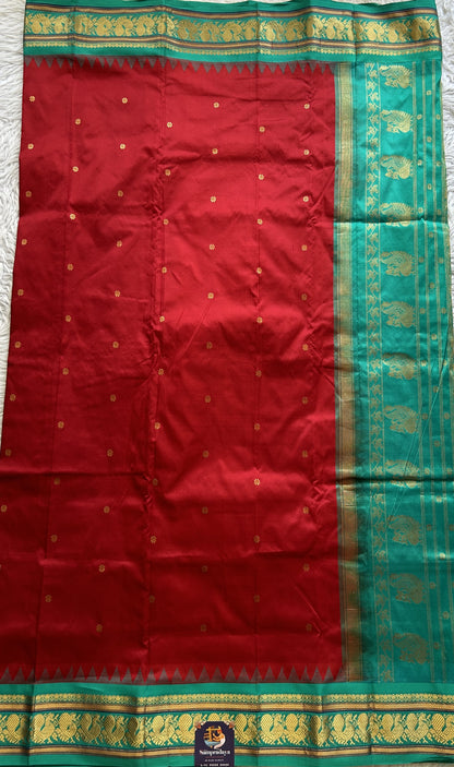 Narayanpet Silk Saree Maroon Colored Complemented with a Rama Green Zari Border.