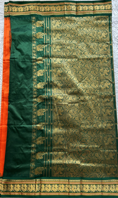 Narayanpet Silk Saree Orange Colored Complemented with a Green Zari Border.