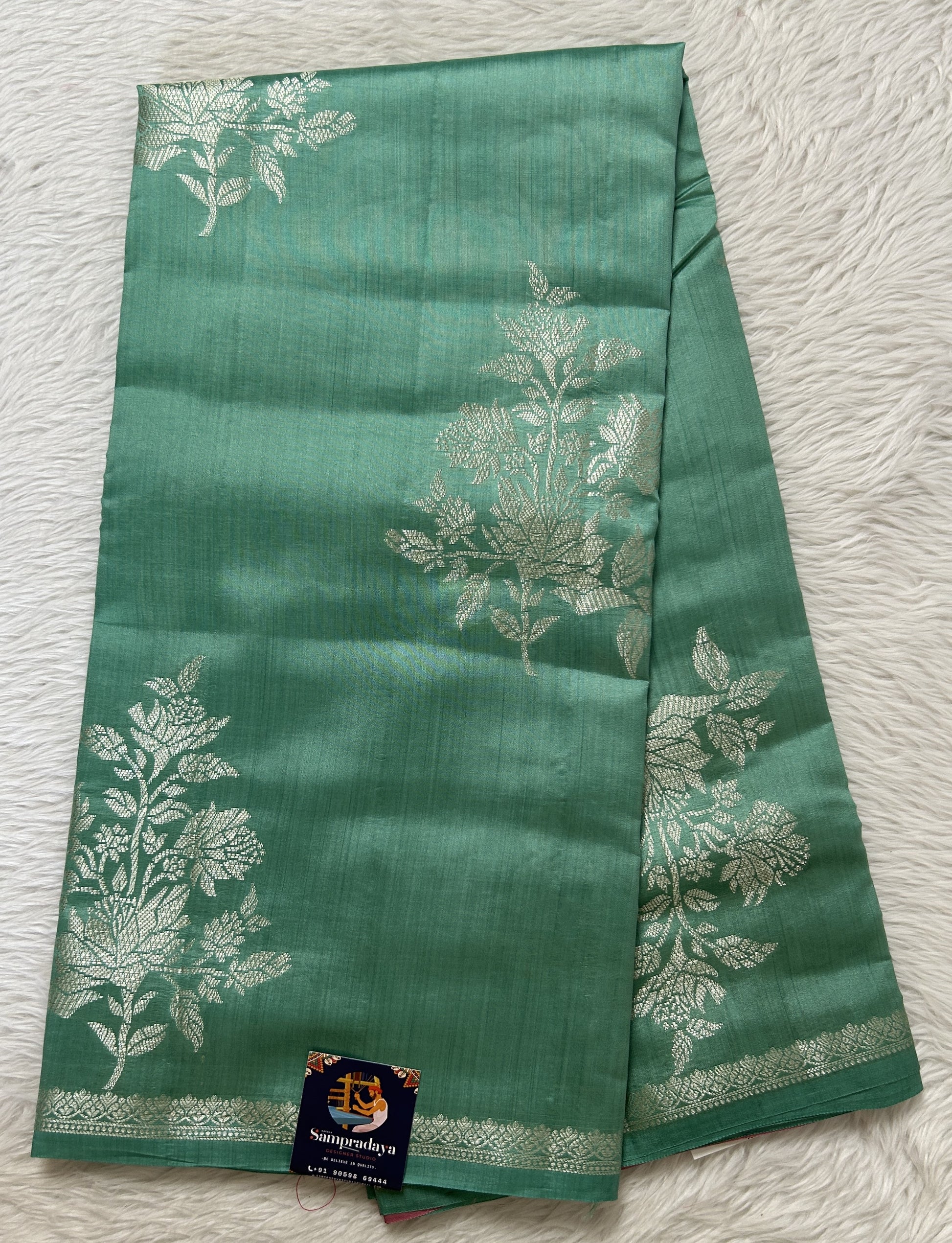 Banarasi Chiniya Silk Saree Sea Blue Colored Complemented with a Zari Border. - Sampradaya Designer Studio