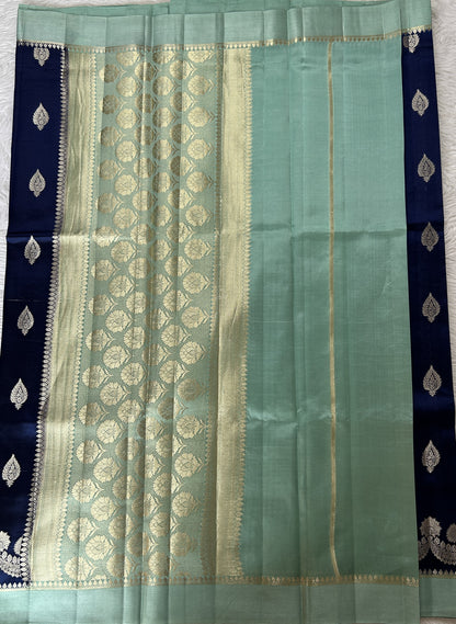 Banarasi Chiniya Silk Saree Deep Blue Colored Complemented with a Sea Blue Plain Border. - Sampradaya Designer Studio