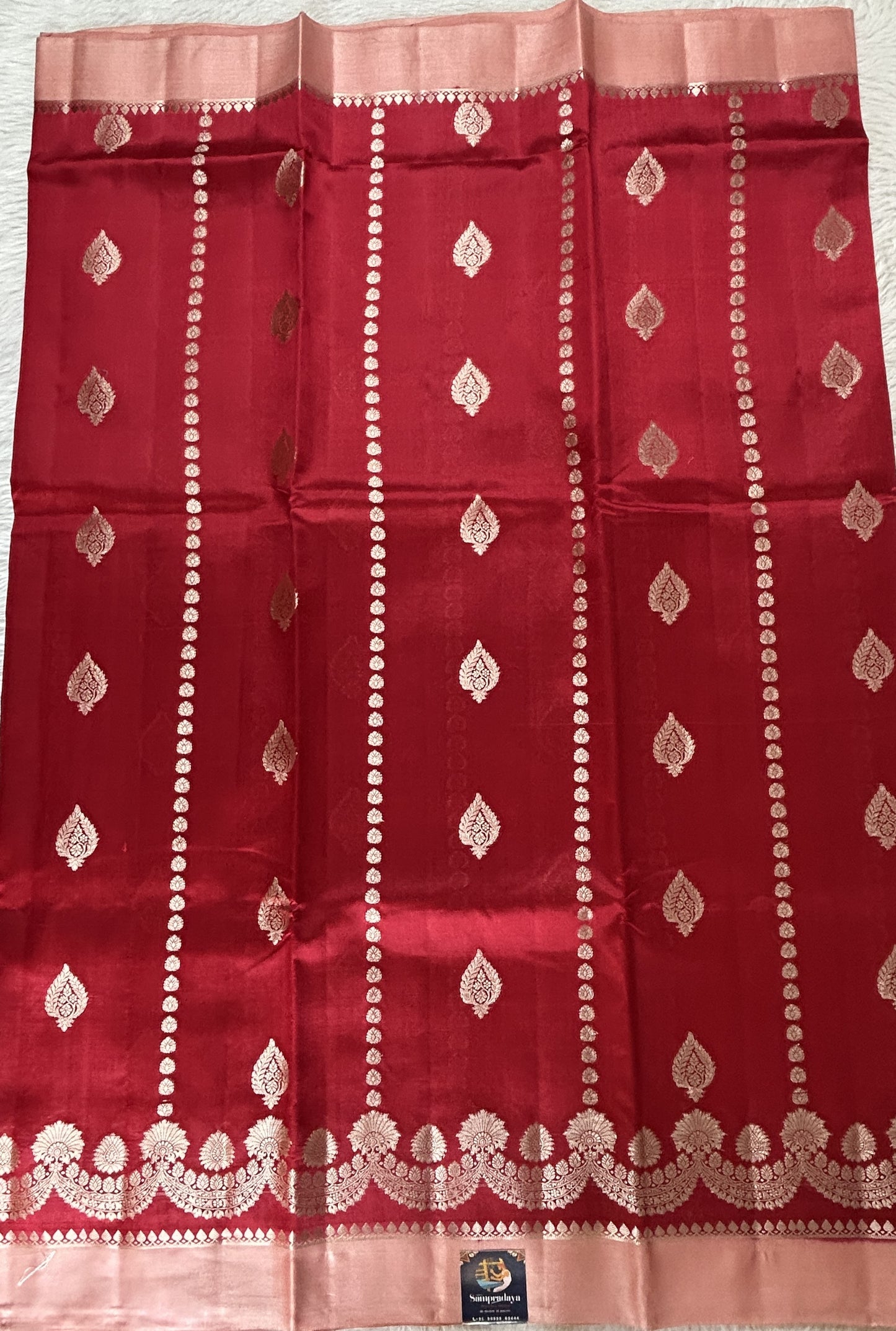 Banarasi Chiniya Silk Saree Red Colored Complemented with a Peach Plain Border. - Sampradaya Designer Studio