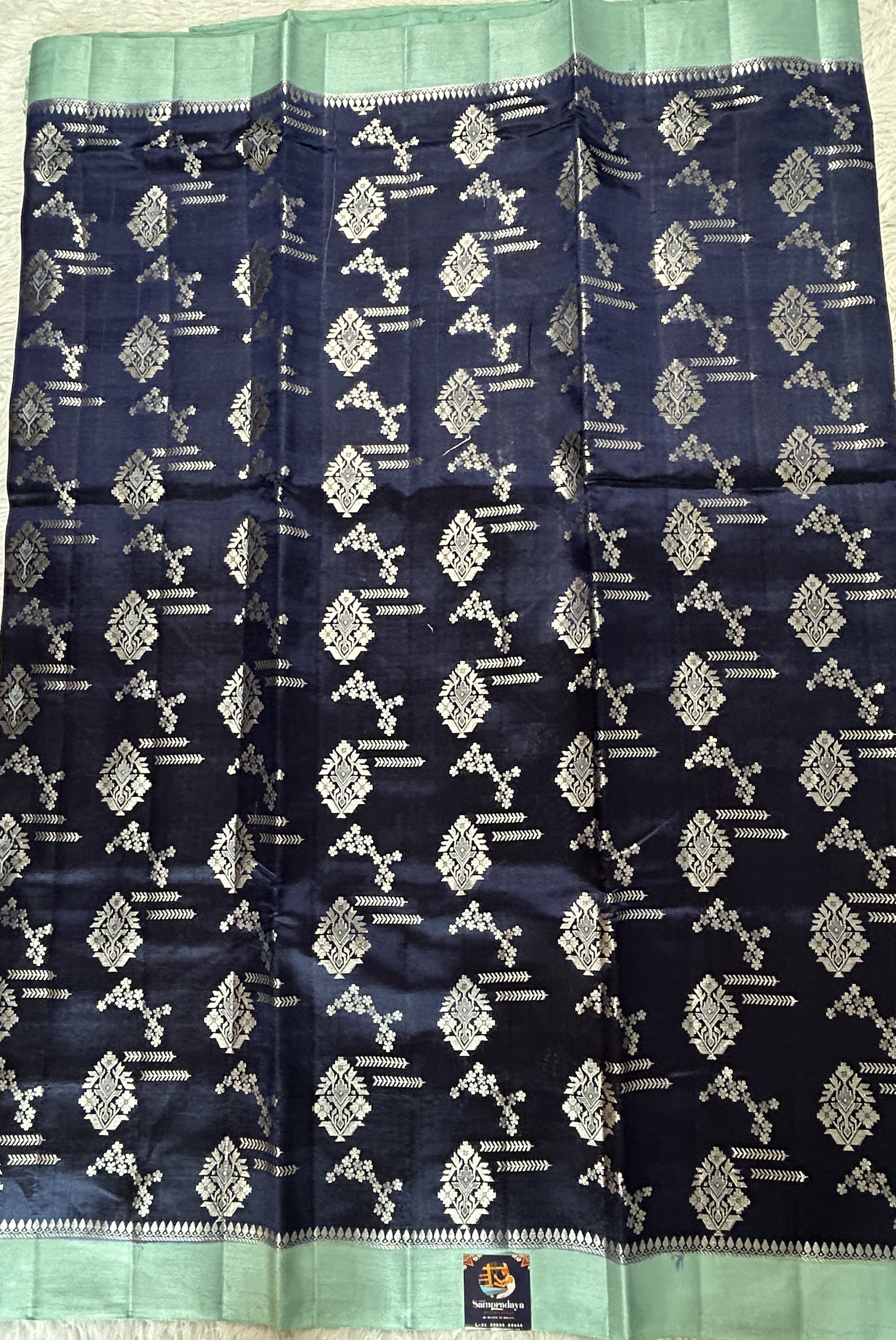 Banarasi Chiniya Silk Saree Ink Blue Colored Complemented with a Sea Blue Plain Border. - Sampradaya Designer Studio